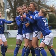 Ipswich Town Women players celebrate their opening goal