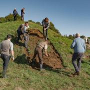 The crew of The Dig prepare the reconstructed burial mounds for filming. Location manager James Cutting says Suffolk can do more to attract large-scale films to the country
