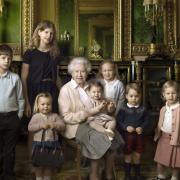 This official photograph, released by Buckingham Palace to mark her 90th birthday, shows Queen Elizabeth II with her five great-grandchildren and her two youngest grandchildren