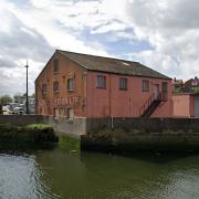 Plans have been submitted to create a four-bedroom home in this former office building overlooking the Waterfront.