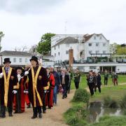 The procession of dignitaries, including the Mayor, Freemen and charity trustees, heads to the Great Common
