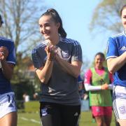 Anna Grey, Sophie Peskett and Maddie Biggs pictured during the lap of honour
