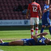 Cameron Burgess reacts after missing a chance at Crewe