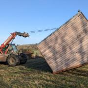 A shed was tipped over at Jimmy's Farm in the winds from Storm Eunice