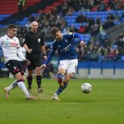 Lee Evans forces first half save with this shot at Bolton Wanderers.