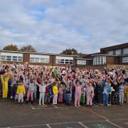A whole school photo from Cliff Lane Primary School, who had a pyjama day for Children in Need