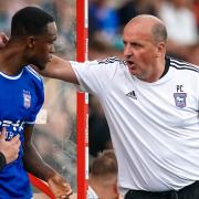 Ipswich Town manager Paul Cook has words with Rekeem Harper before his second half introduction at Lincoln City last weekend.