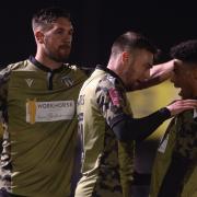 Freddie Sears of Colchester United celebrates with Luke Chambers and Sylvester Jasper