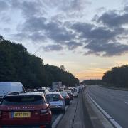 A 64-year-old man from Ipswich has been arrested after four people have died following a crash on the M25