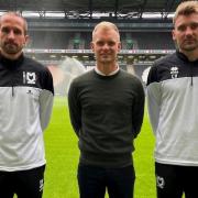 The trio of former Ipswich Town players now coaching at MK Dons (L-R): David Wright, Liam Manning and Chris Hogg