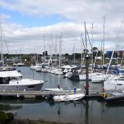 The man was rescued from a boat at Fox's Marina in Ipswich
