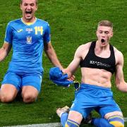 Ukraine's players celebrate their last minute win over Sweden - they face England in the Euro 2020 quarter-finals in Rome today