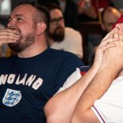 England fans at the Gardeners Arms cannot believe it as their team draws with Scotland.