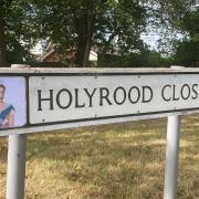 Holyrood Close have decorated their road signs with pictures of the Queen as a commemoration of her life and a nod to her current resting place, the Palace of Holyroodhouse.