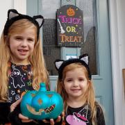 Ruby and Holly with their teal coloured pumpkin Picture: RACHEL EDGE