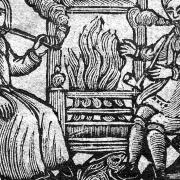 The History of Witches and Wizards, 1720. Pictured: A cunning woman and cunning man sit infront of a fire. Picture: Wellcome Collection