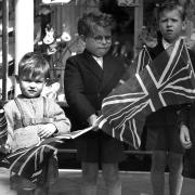 Children lined the streets of Ipswich to greet the Queen in 1961.