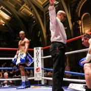 Fabio Wardley, left, celebrates as ref Ian John Lewis waves off the action in the first round at the Ipswich Corn Exchange. Picture: SARA THOMAS