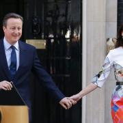 Prime Minister David Cameron walks out of  10 Downing Street, London, with wife Samantha. Photo: Daniel Leal-Olivas/PA Wire