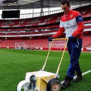 Writtle College groundsman student Tom Grafen from Glemsford at the Emirates Stadium, home of Arsenal Football Club, where he is an apprenice.