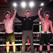 Cameron Knox-Johnstone (left) has raised £360 for EACH in a charity boxing match