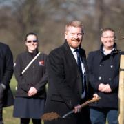 Peter Wilson, group MD, planting a tree in Christchurch Park to celebrate 180 years of trading Picture: Sarah Lucy Brown