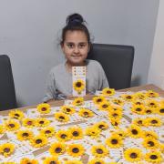 Dejah Robinson made 50 badges to give to Lighthouse Women's Aid and a further 50 for her nanny's care home.