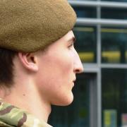 Staff and students at Suffolk New College have held an open-air parade to mark Armistice Day