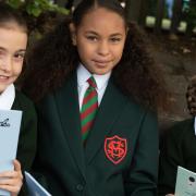 Three friends at St Margarets Primary School have formed a Black history book club. L-R Isla, A'niah and Jasmine.