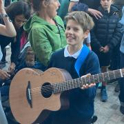 A lucky ten-year-old came away with a priceless memento after attending Ed Sheeran\'s impromptu concert on the steps of Ipswich town hall.