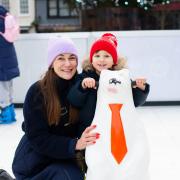 Julia and Hector enjoy the ice skate rink on Ipswich Cornhill