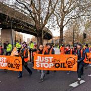 Just Stop Oil protestors in London. A slow march is planned to take place in Ipswich on Saturday