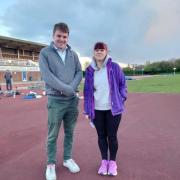 Tom Hunt at Northgate Athletics Track with Chair of Ipswich Harriers, Mandy Godbold