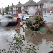An Ipswich road became flooded during heavy rainfall