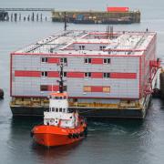 An accommodation barge arriving in Falmouth, Cornwall