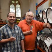 CAMRA volunteers Timothy Howard and Mike Lewis help to set up the Ipswich Beer Festival