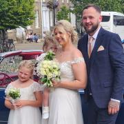 Ben and Amy Norton, from Ipswich, tied the knot in Bury St Edmunds on Thursday with their two little girls, Maisie and Evie, as flower girls.