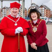 Ipswich Central is hoping to use Cardinal Wolsey (played by Phil Roberts) to boost the town - here he is pictured with mayor Lynne Mortimer.