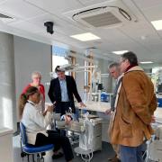 Ipswich MP Tom Hunt and fellow Conservative MPs Peter Aldous and James Cartlidge visiting the new dental centre in Ipswich