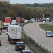 Traffic is queuing as a lorry blocks one lane of the A12