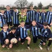 Holbrook Academy U13 Boys are celebrating after reaching the final of a national tournament