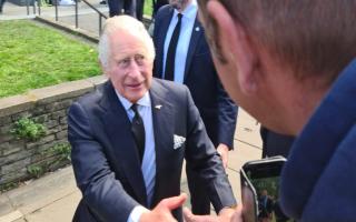 King Charles III meets the crowd on a walkabout at Lambeth Bridge