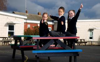 Local housebuilder Crest Nicholson has gifted an Ipswich primary school with new colourful outdoor benches in a much-needed upgrade.