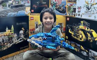 7-year-old Beaumont with his LEGO shark design. Credit: Supplied by family