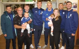 Ipswich Town players and staff visited three hospices this week to spread Christmas joy