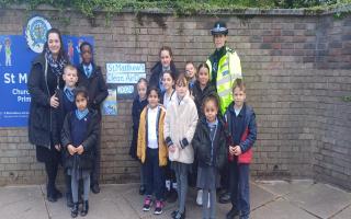 St Matthew's Church of England Primary School children on Clean Air Day, with Kasia Zych (left) and PC Hallatt (right)